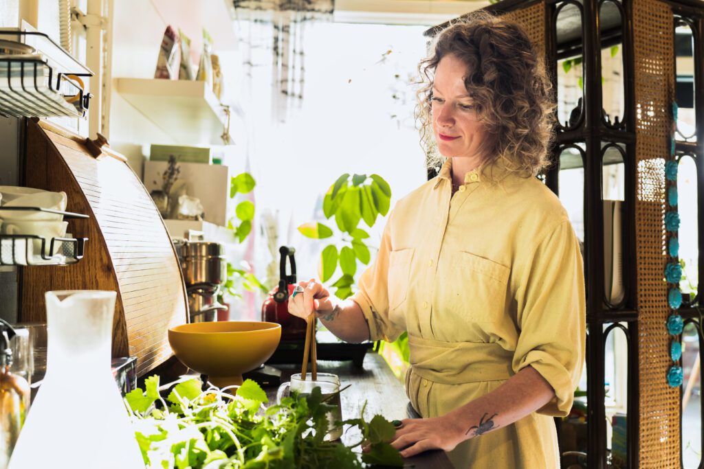 brand photo of a business owner preparing her tea