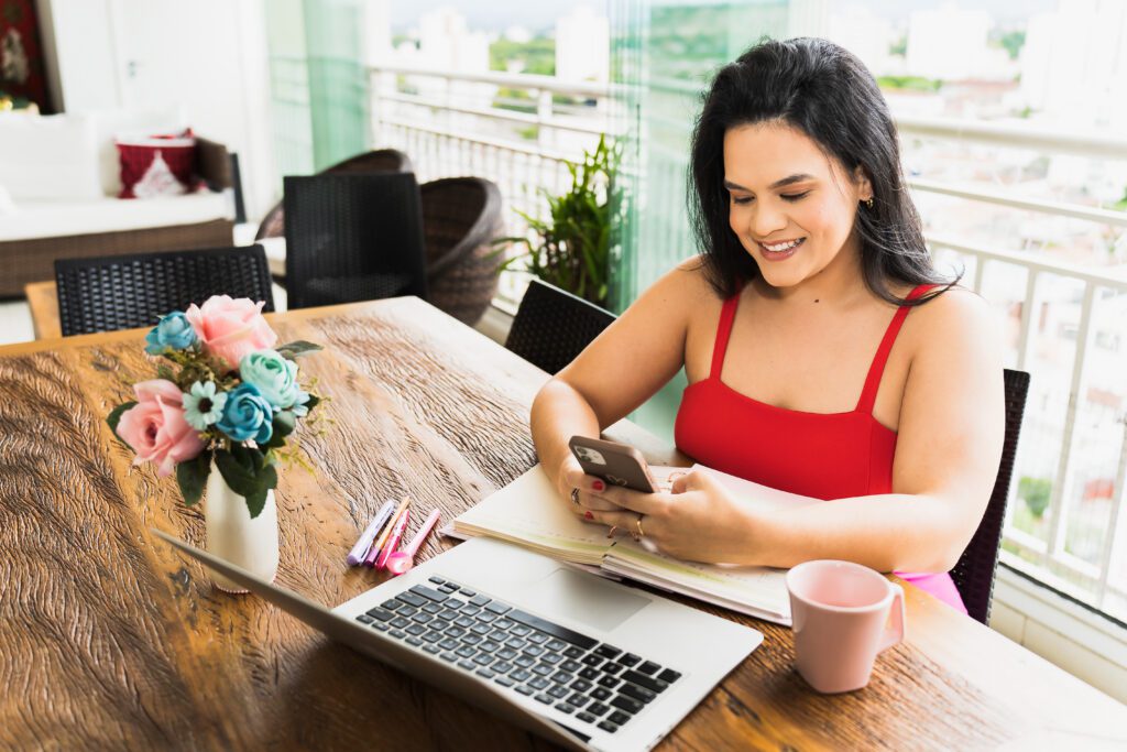 make up artist booking her next client on phone