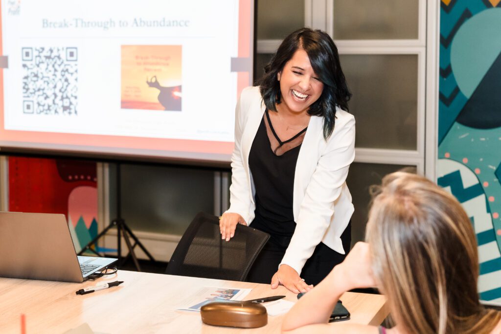 brand photo of a Public Speaker during a women's network event
