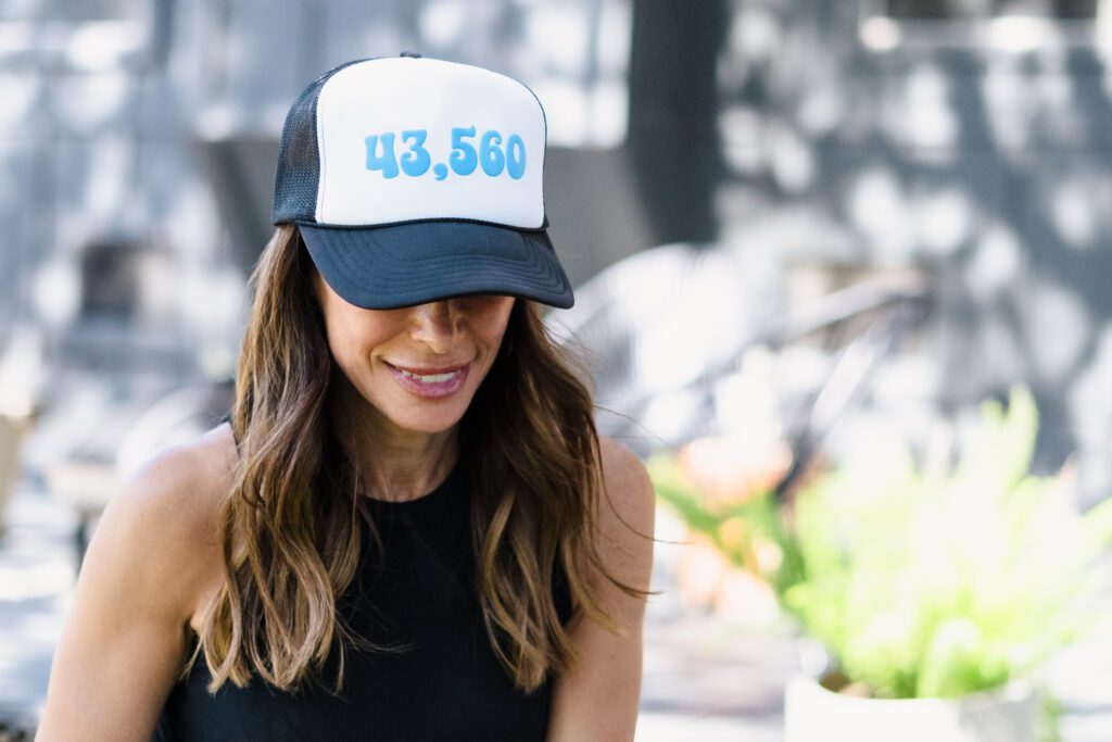 A woman wearing a fun cap