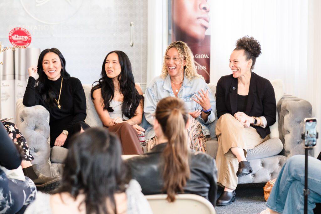 Panel of inspiring women entrepreneurs sharing insights during the Radiate & Rejuvenate wellness networking event in Sacramento, photographed by Geise Pinto.