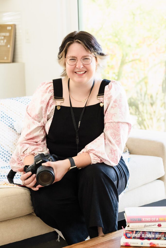 Natural headshot of photographer with confident expression and clean background